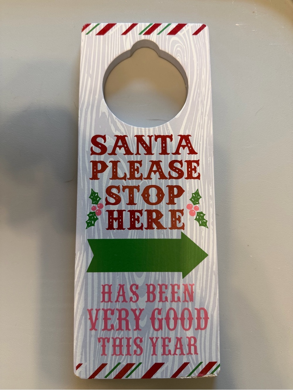 Gibson White Door Hanger with Red Lettering and Green Arrow